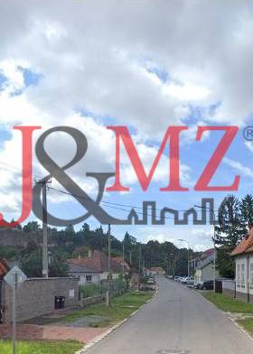 Staveb. pozemok, intravilán 1.382m2, šírka 24m, Levice